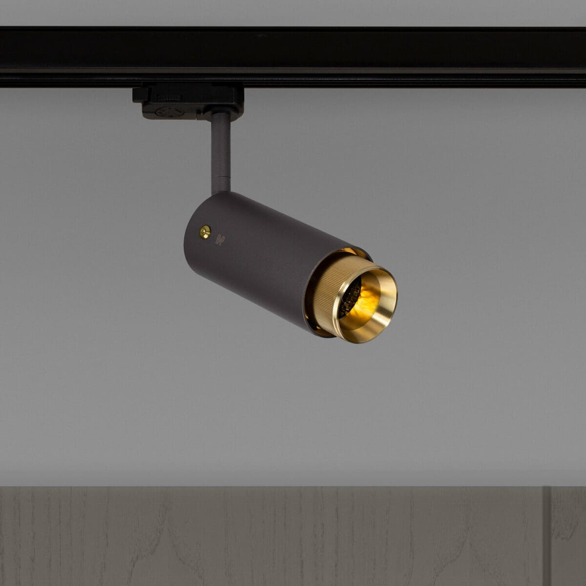 1. Exhaust CE Track Graphite Brass ON